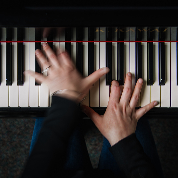 Dr. Izbicki playing the piano