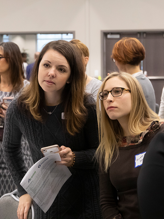 two county community members gathered at the UWF Conference Center