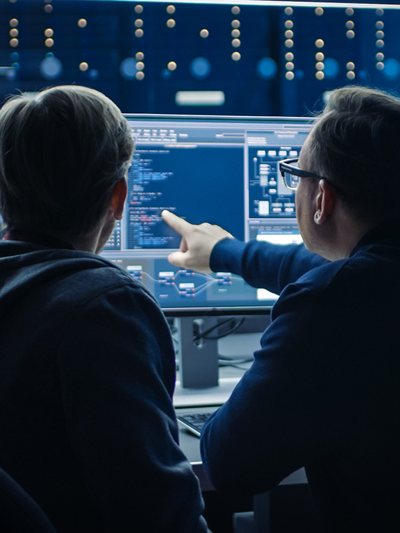 a computer science student working in a computer lab