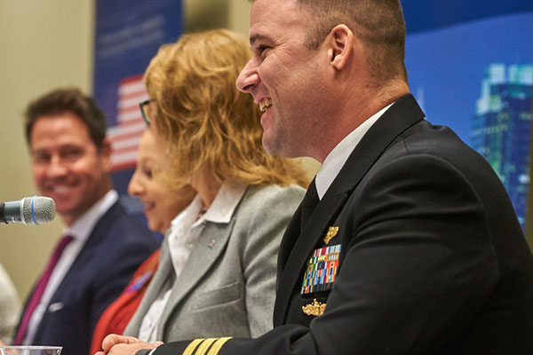 information security officials speaking on a panel at a conference