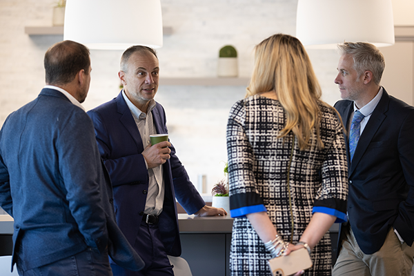 Human Resources employees conversing