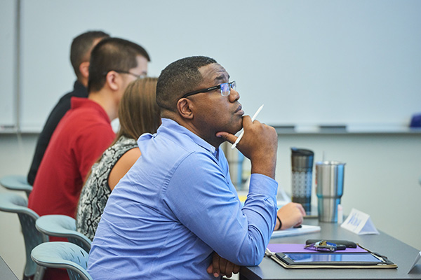 management students in class