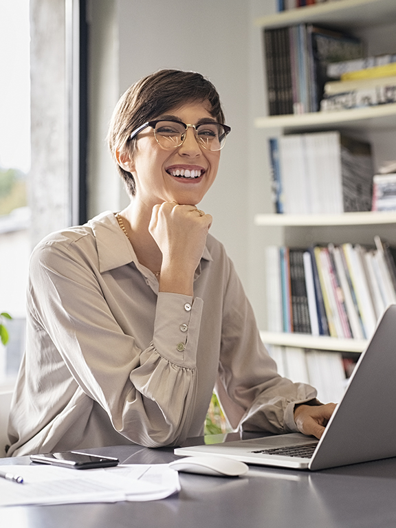 Successful business entrepreneur working on computer