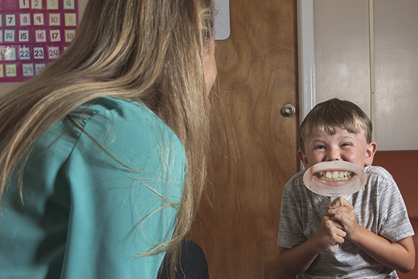 Applied Behavior Analysis Behavior Analyst working with a young client.