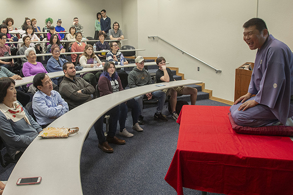 Classroom full of people watching an international culture presentation.