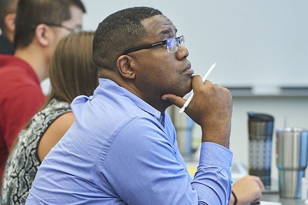 Business professional in a conference meeting.