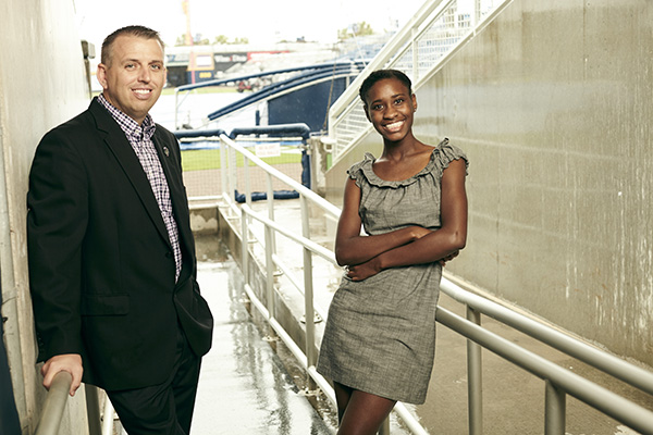 sport management students inside a stadium walkway