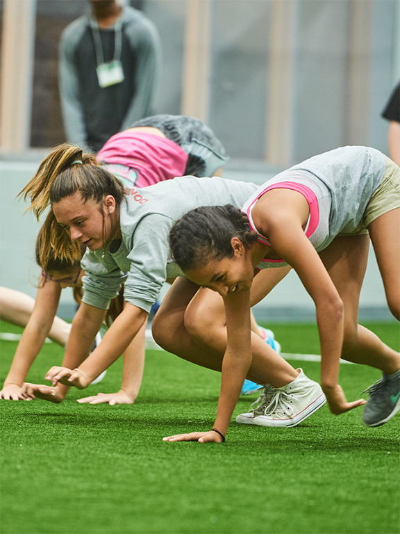 UWF health and phys ed students learning exercise drills in the pedagogy gym