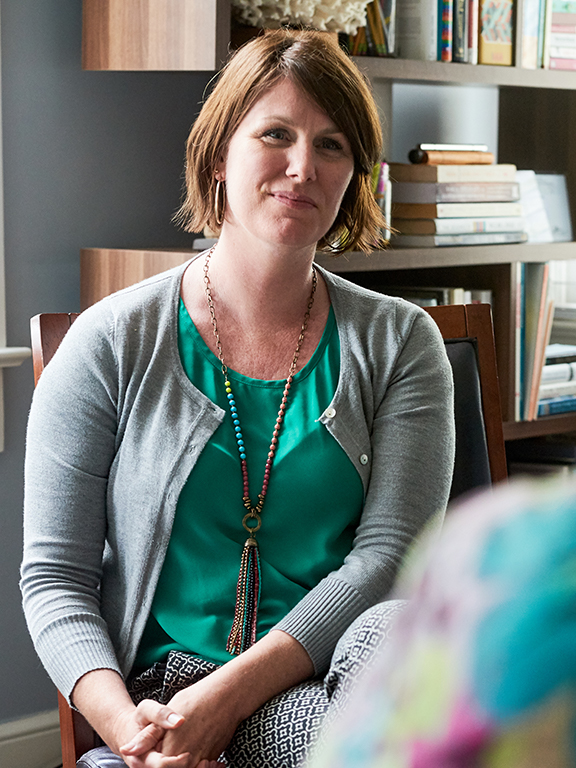 Social worker meeting with a client.