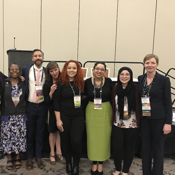 Dr. Allysha Winburn and Antaya Jennings with other anthropologists at a conference