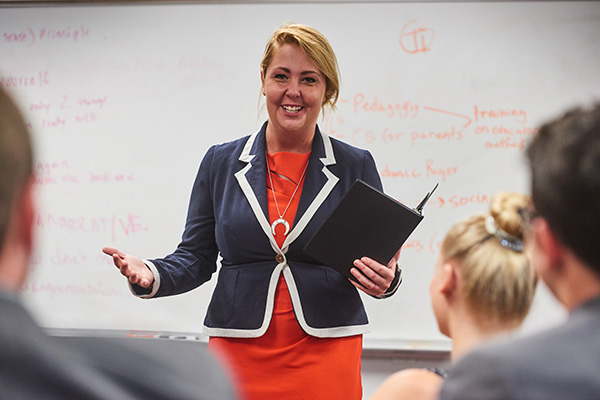 communication student practicing public speaking in class