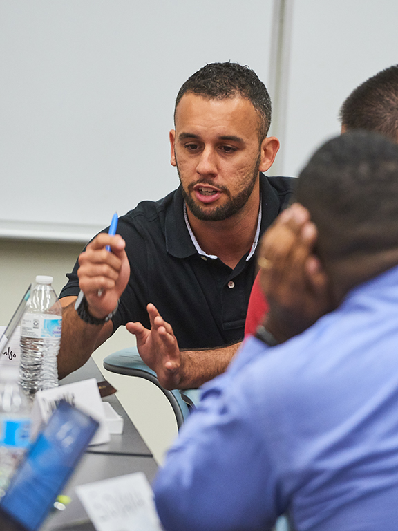 Student speaking to classmates	