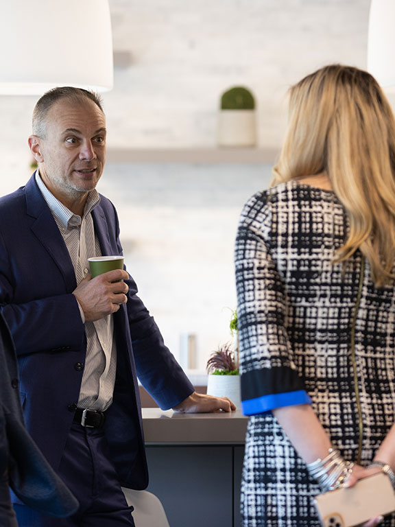 Human Resources employees conversing
