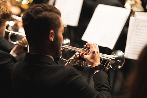 student playing a trumpet