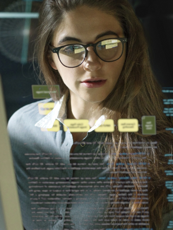 Mathematical professional reviewing data on a see-through screen.
