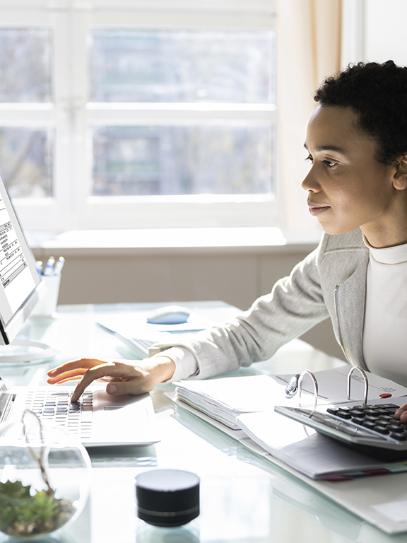 Healthcare Administrator on computer