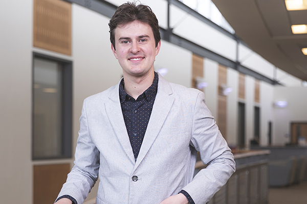 Business student in professional attire.