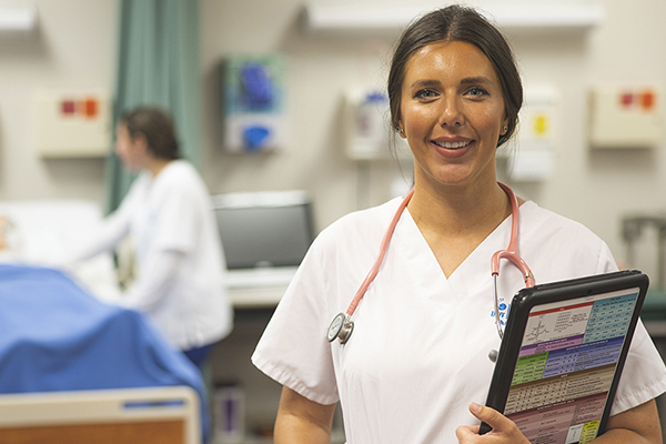 Nursing student in a hospital environment.