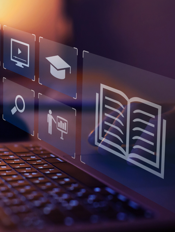 Seven square-shaped virtual icons related to Instructional Technology displayed above a laptop keyboard.