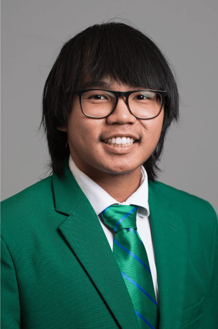 Headshot of a Student ambassador with a green jacket on