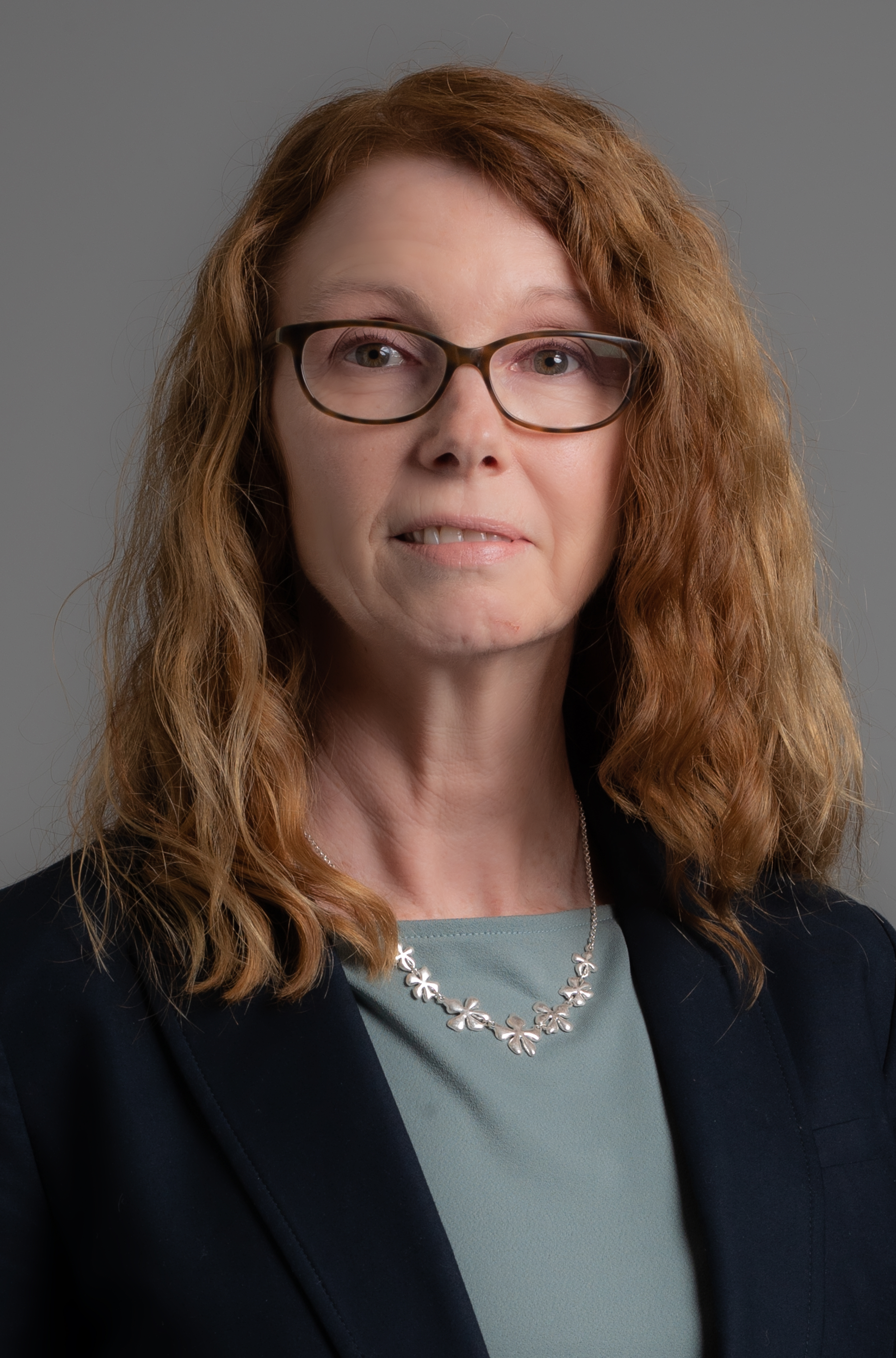 Gina Sharp headshot.