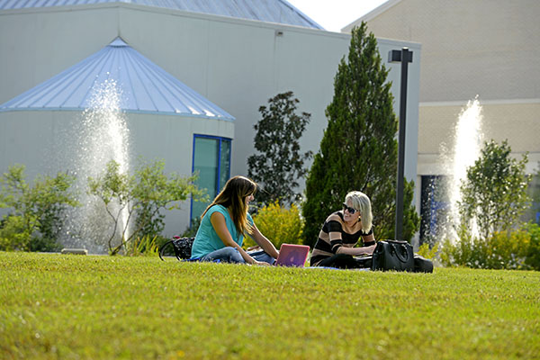 arts administration students studying on the cfpa lawn